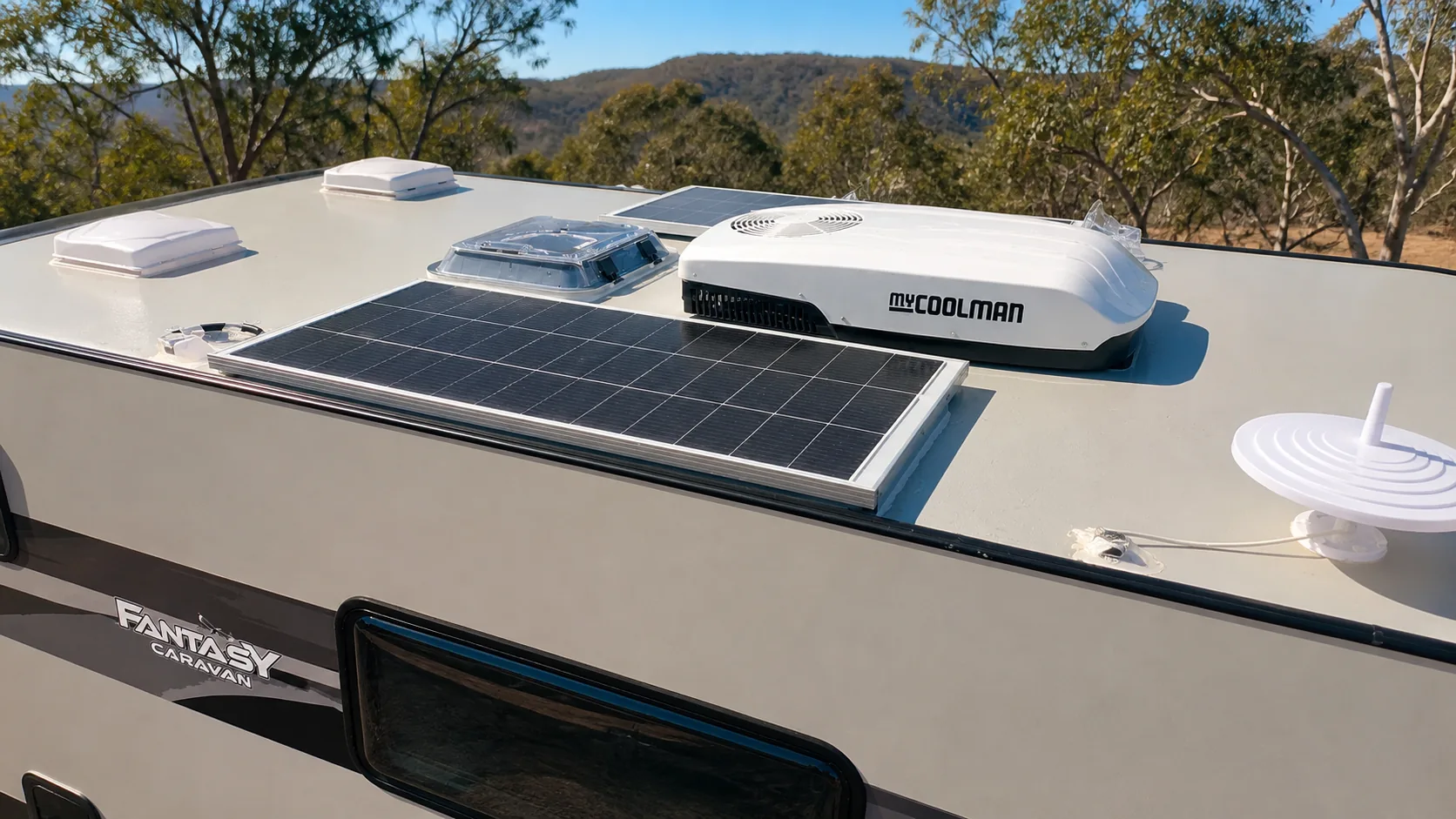 Roof of a Skyline caravan fitted with a solar panel, air conditioner unit and antenna