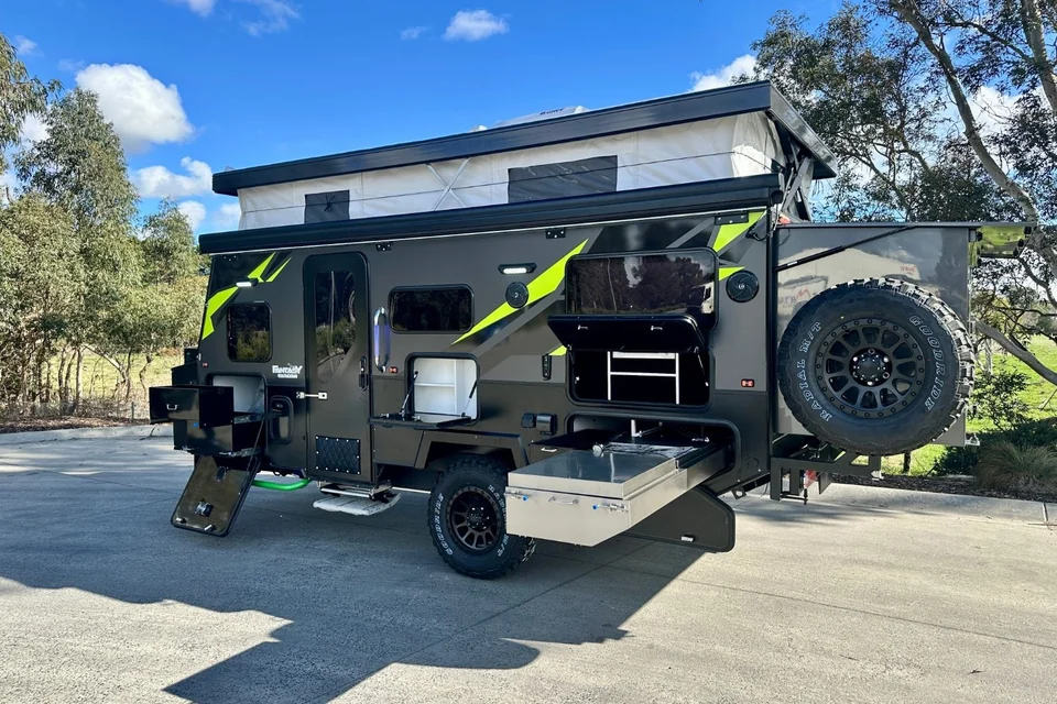 Frontier 48V pop-top hybrid caravan with the roof raised