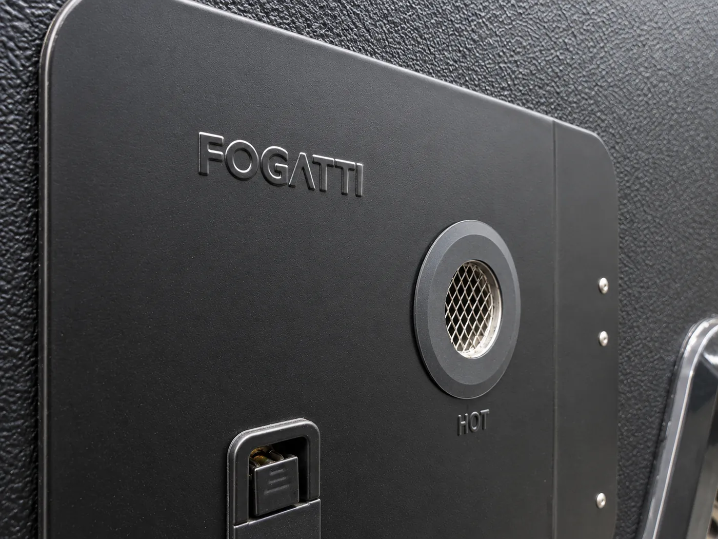Fogatti hot water unit on the side of a Horizon caravan