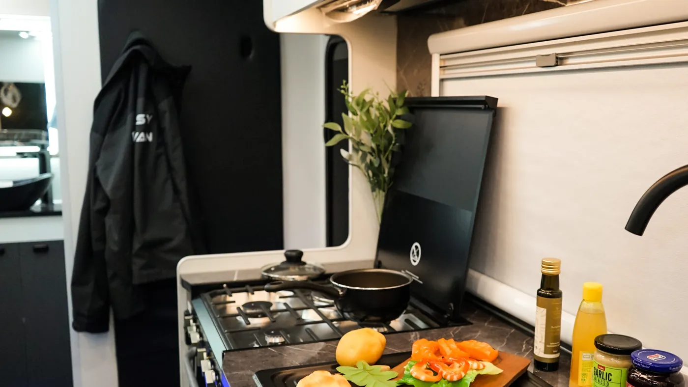 Horizon indoor cooktop in use, with fresh ingredients on the bench
