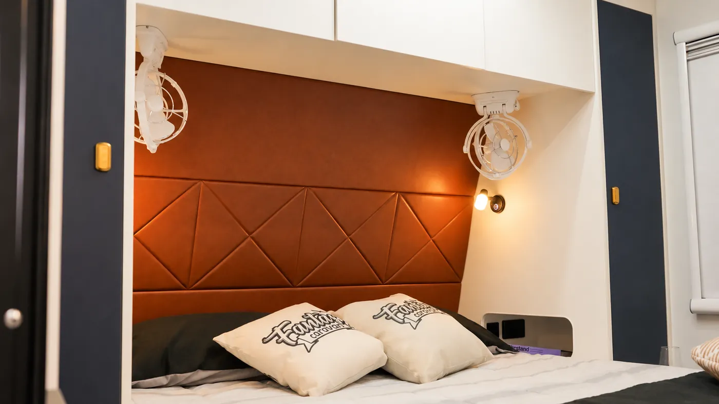 Horizon padded headboard with geometric stitching and cushions